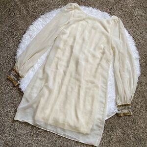 Bebe Dress Lined Cream Long Sleeve Beaded Cuffs Open Arm Women’s Size Small FLAW